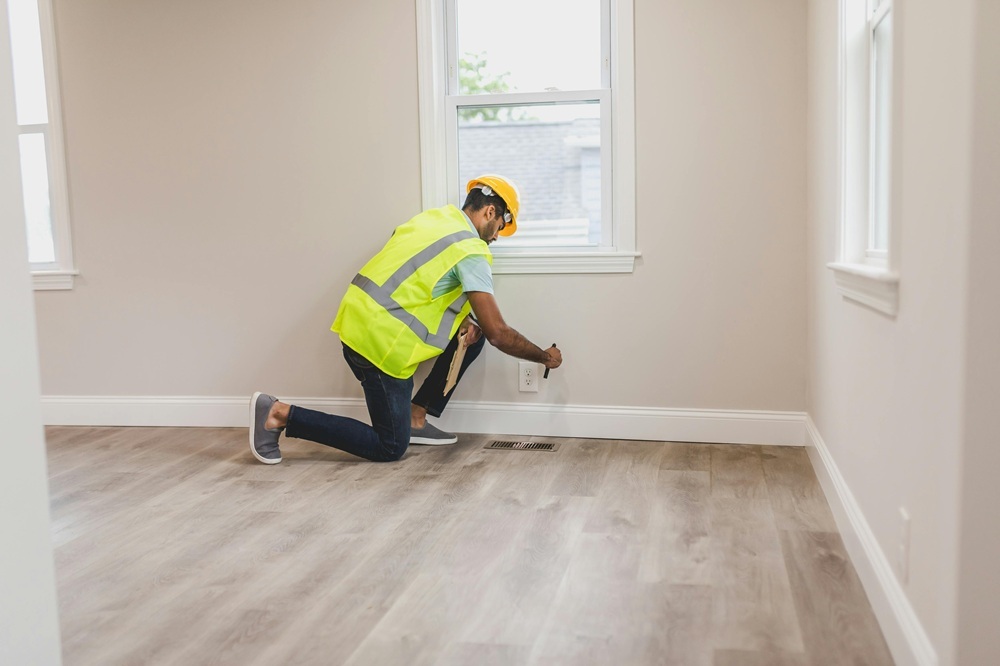 Construction inspection and progress review during Warsaw apartment renovation