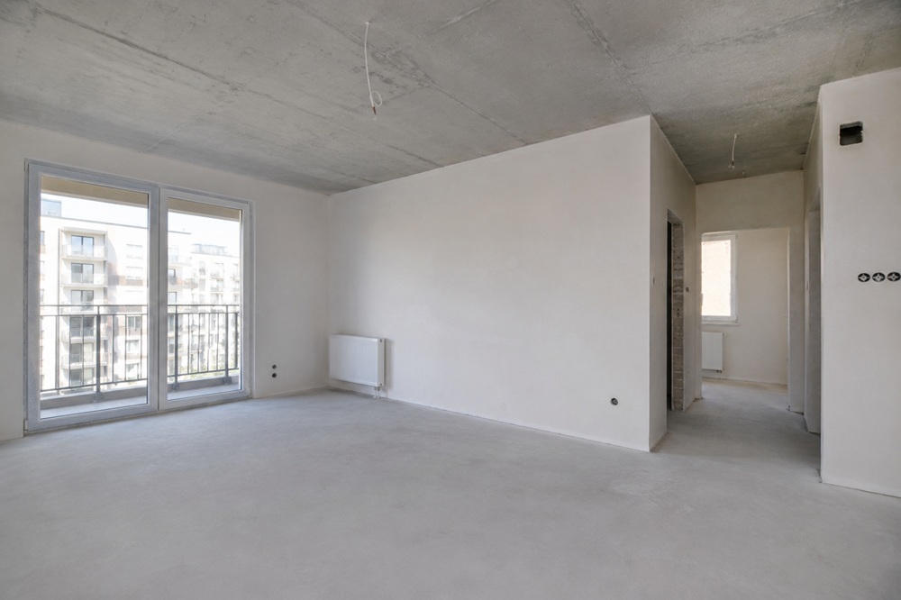 New build apartment in shell condition in Warsaw — developer standard before finishing works begin