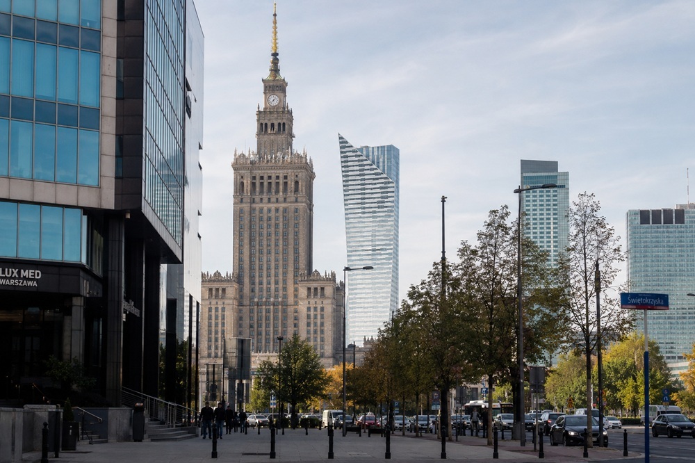 Warsaw city centre street level with Palace of Culture and financial district — property negotiation service in Warsaw