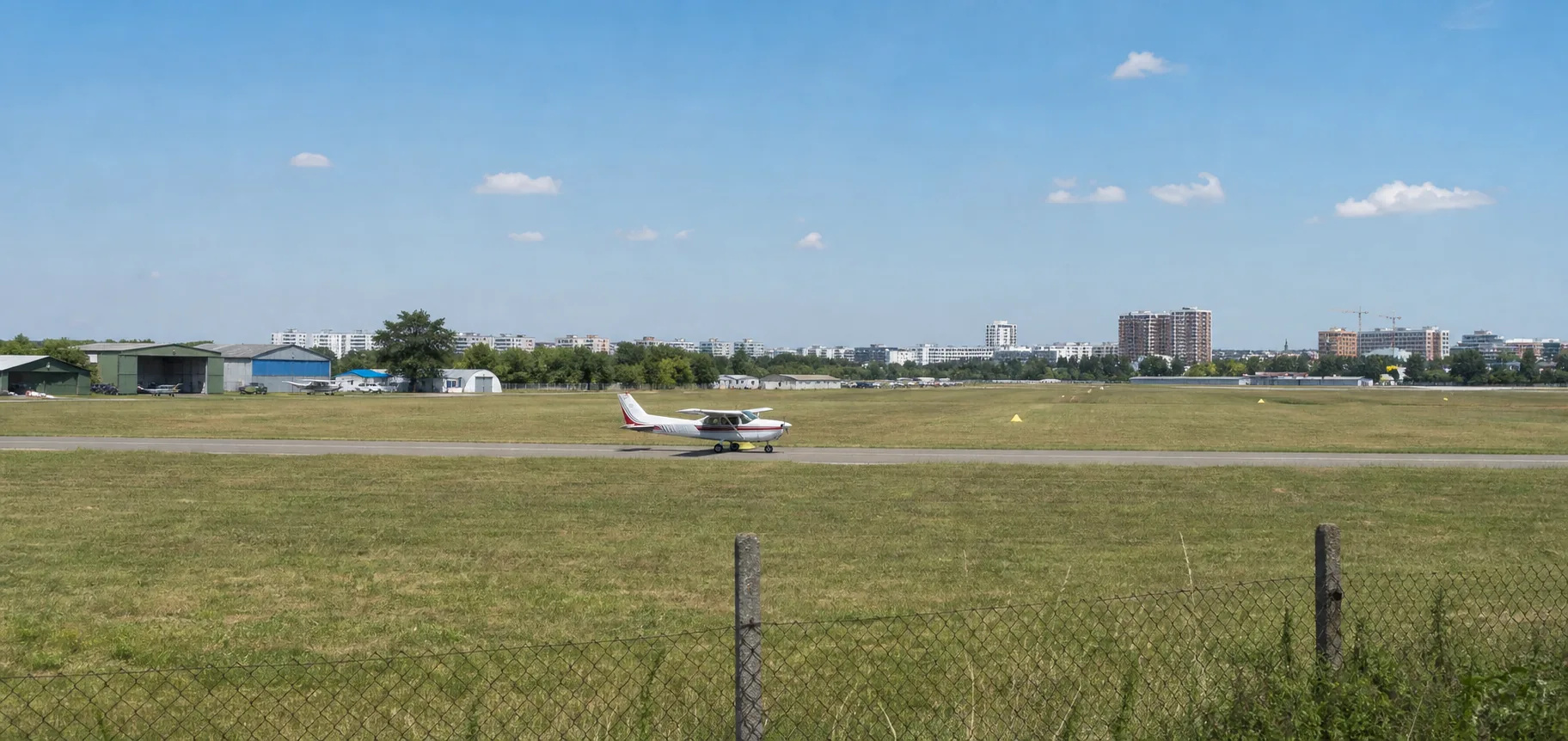 Small general aviation aircraft on the grass airfield in Warsaw Bemowo