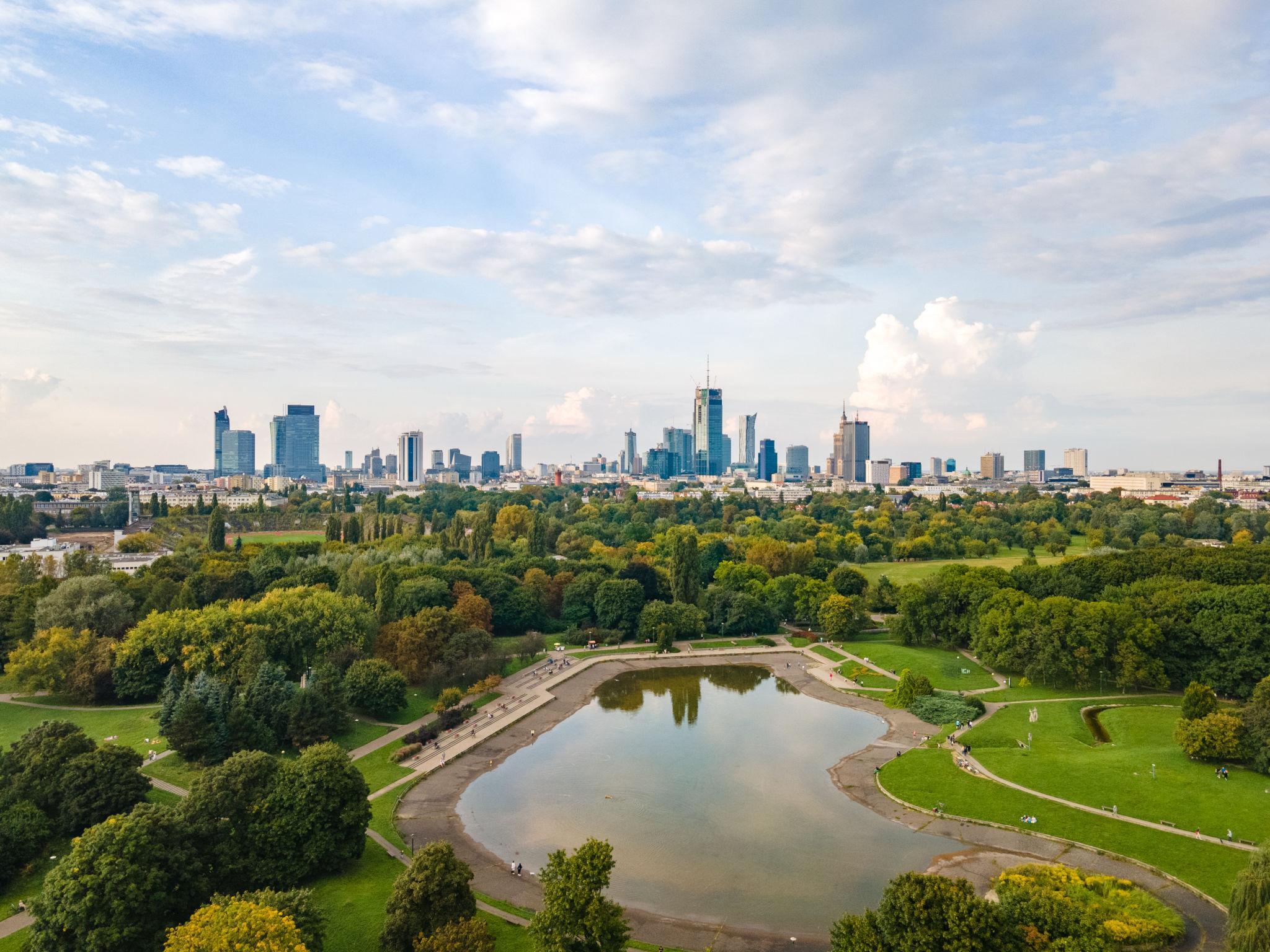 Aerial view of a green Warsaw park surrounded by the city