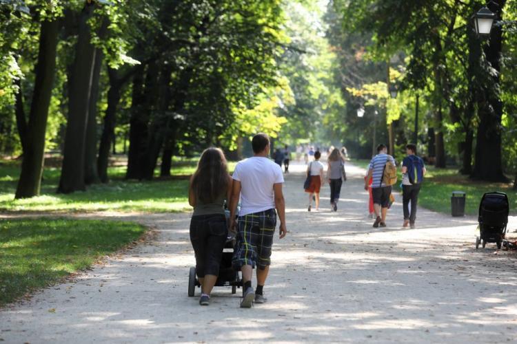 People relaxing in a Warsaw park on a sunny day