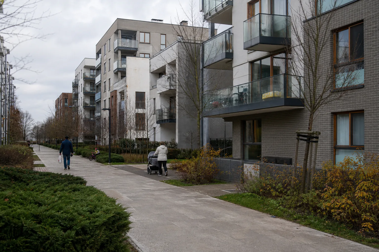 Modern residential street with landscaped pedestrian space in Warsaw Ursus