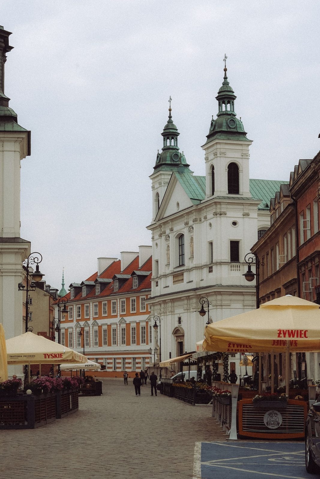 Historic Warsaw church street illustrating protected urban fabric and tenement surroundings