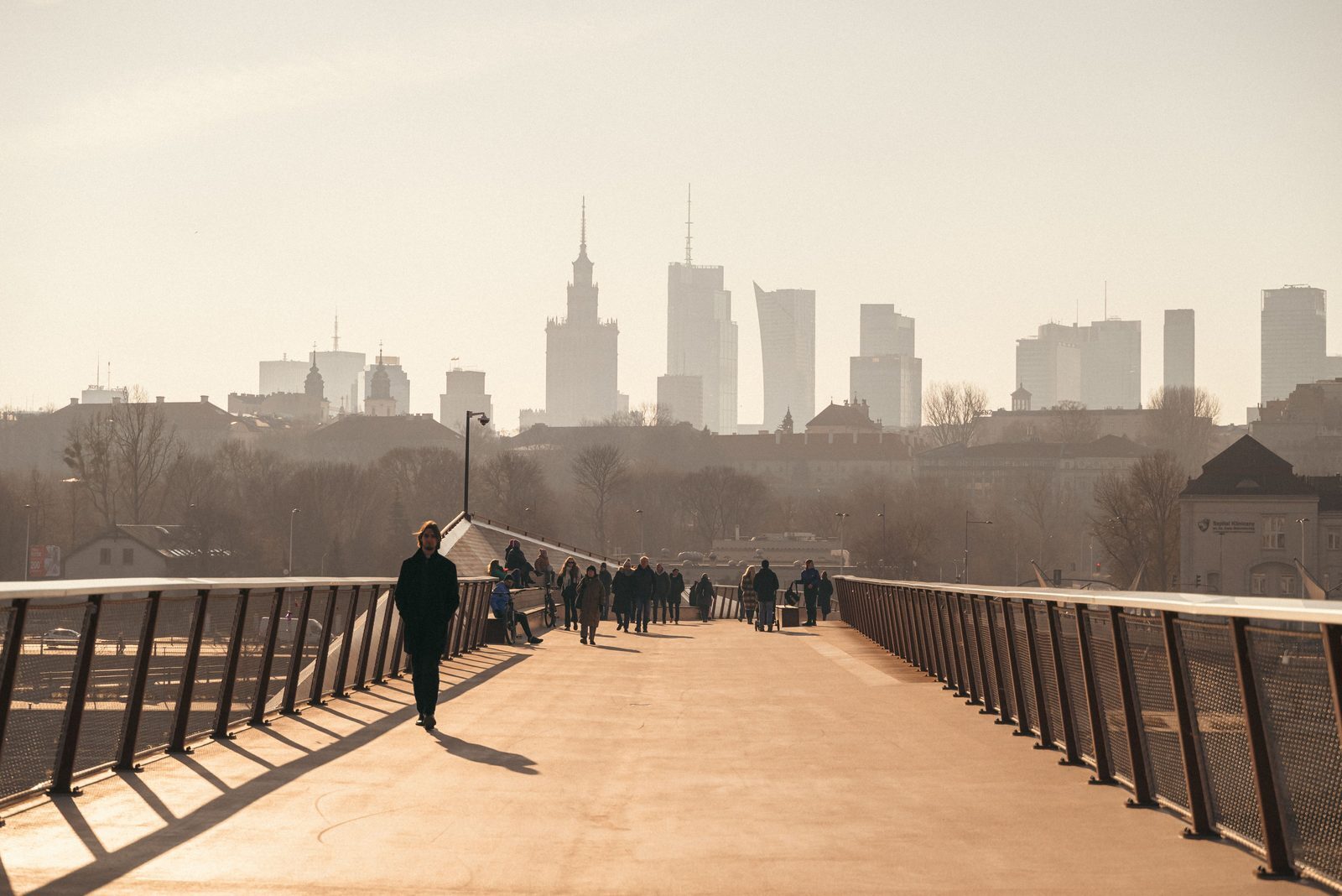 Pedestrian and cycling bridge leading toward the Warsaw skyline